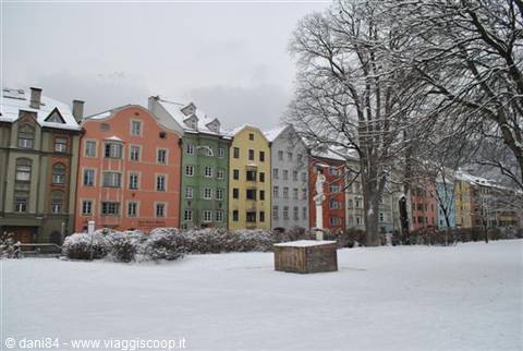 Colorful houses under snow along the Inn river, Innsbruck