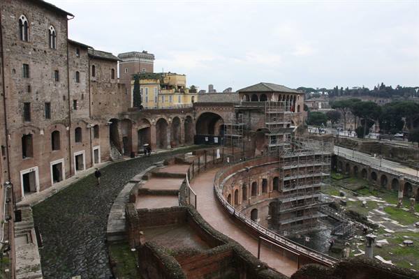Trajan's Market: brick walls, arches and scaffolding under a grey sky