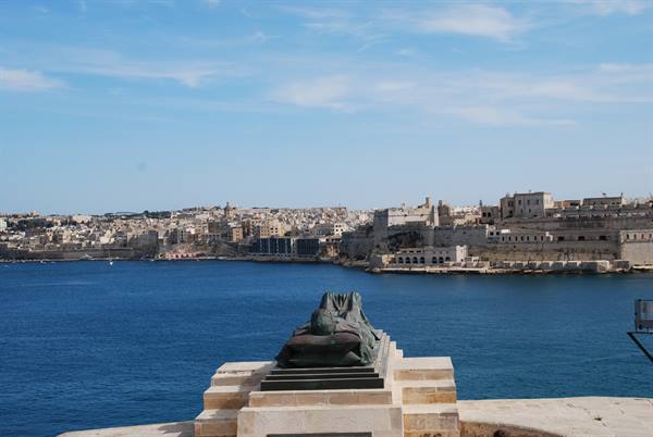 Bronze monument at the Siege Bell Memorial overlooking Valletta's Grand Harbour