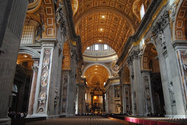 Inside St. Peter's Basilica: gilded vault, marble columns, Bernini's canopy