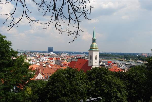 St. Martin's Cathedral in Bratislava among red rooftops and the Danube