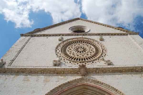 Stone rose window on the facade of the Basilica of San Francesco, Assisi