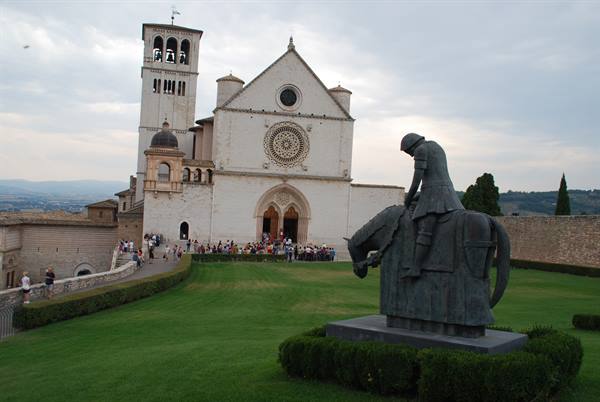 Bronze horseman statue in front of the Basilica of Saint Francis in Assisi