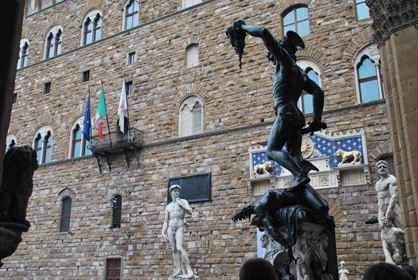 Cellini's bronze Perseus statue in front of Palazzo Vecchio, Florence