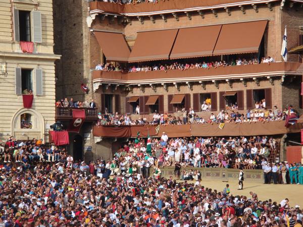 Crowded stands in Siena's Piazza del Campo during the Palio horse race
