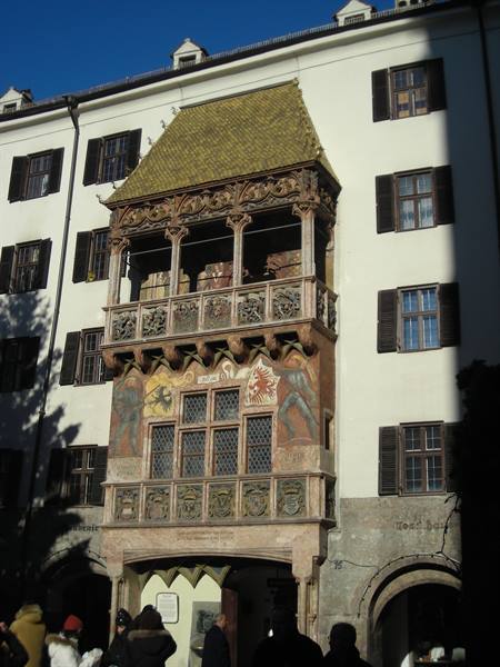The Golden Roof in Innsbruck, Gothic oriel with gilded tiles, tourists below