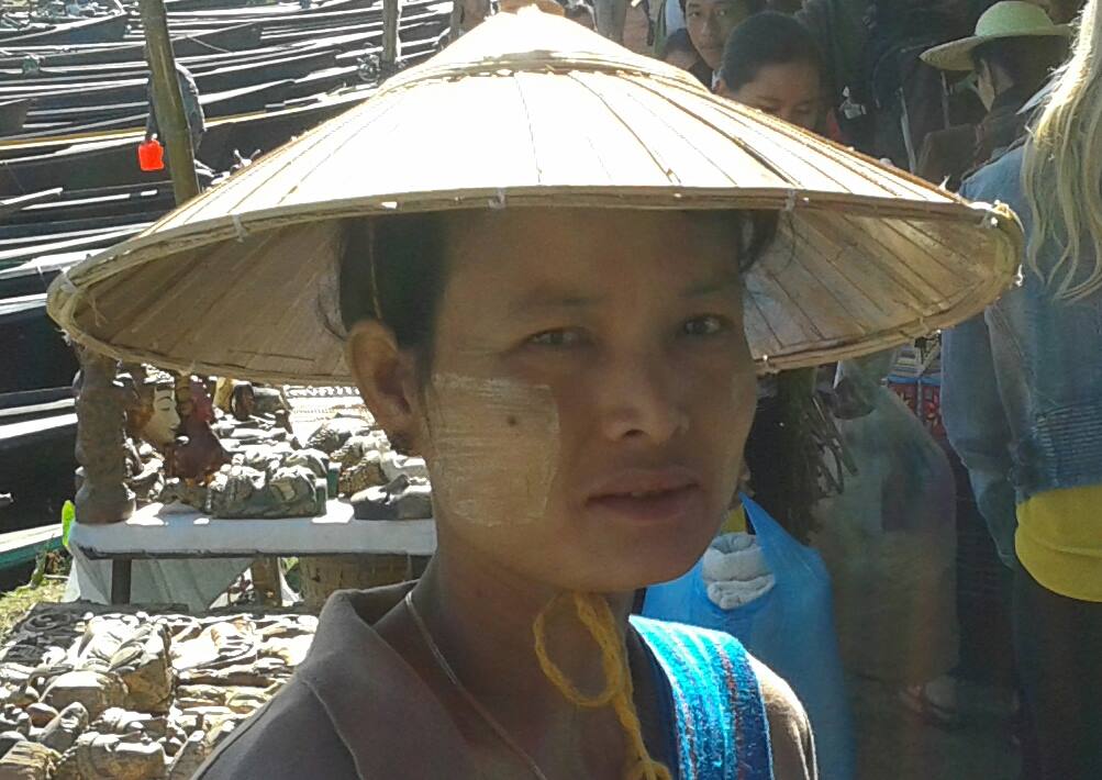 Woman with thanaka on her face