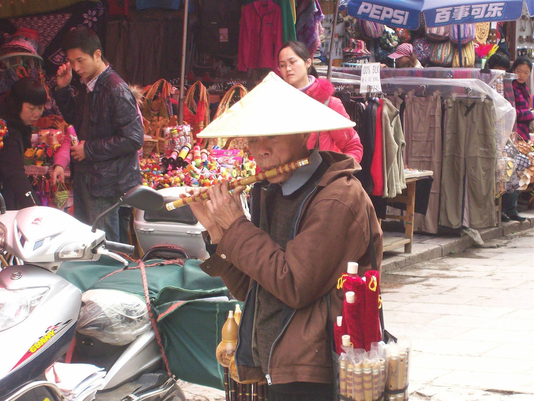 Flute seller in Yangshuo