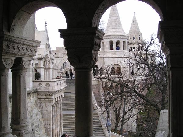 Tourists beneath the stone arches of Fisherman's Bastion, Budapest
