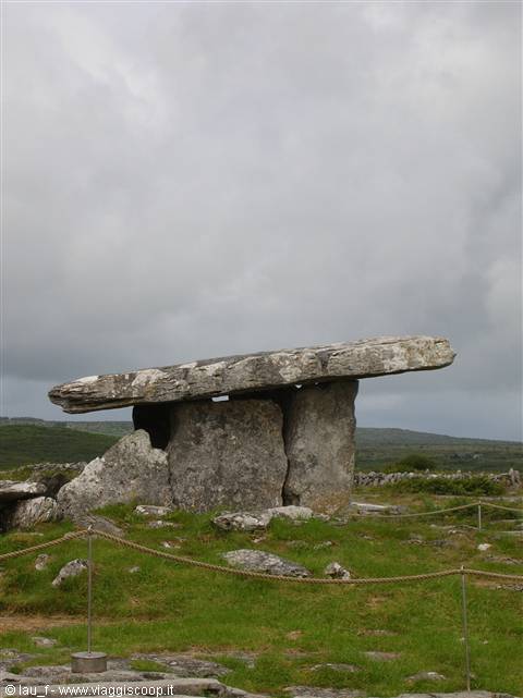 Poulnabrone dolmen in the Burren, limestone slabs under cloudy skies