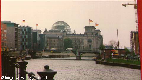 The Reichstag glass dome along the Spree river in Berlin
