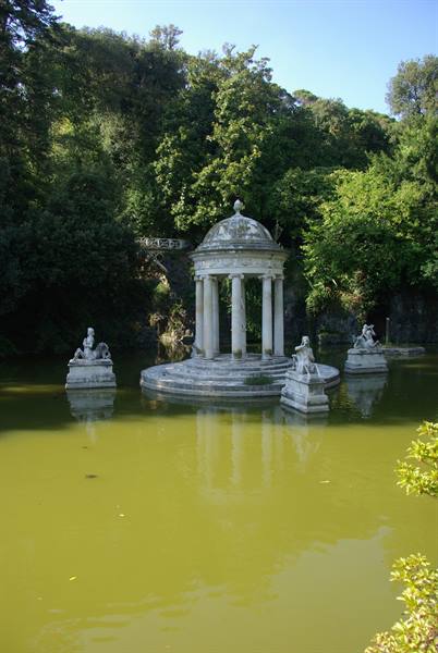 Round marble temple on green lake with statues, Villa Durazzo Pallavicini, Genoa