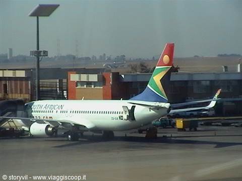 South African Airways Boeing parked at Johannesburg airport, flag tail