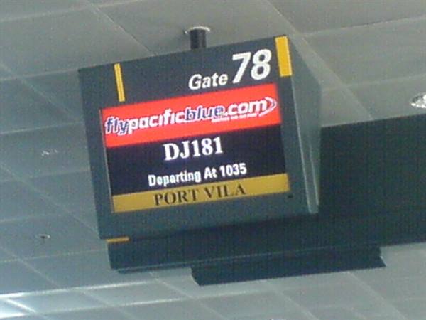 Airport screen at Gate 78: Pacific Blue flight DJ181 to Port Vila