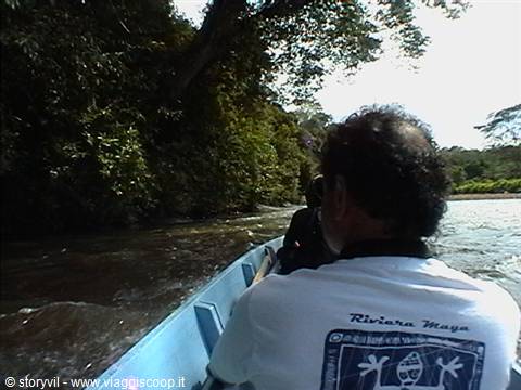 Man in canoe on the splendid Rio Dulce lagoon