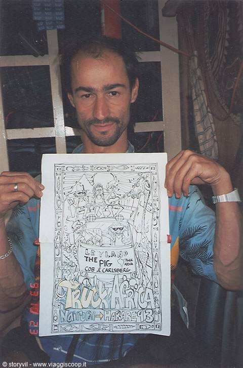 Man holds up a black-and-white drawing reading Truck Africa Nairobi Harare 93
