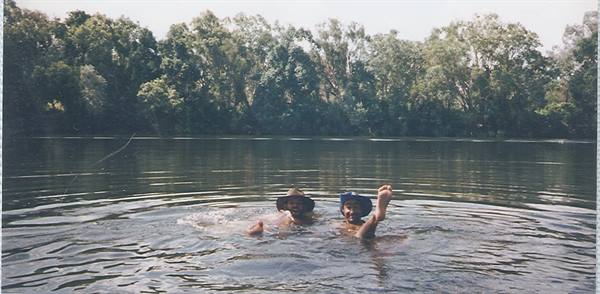 in the water with the harmless freshwater crocodiles