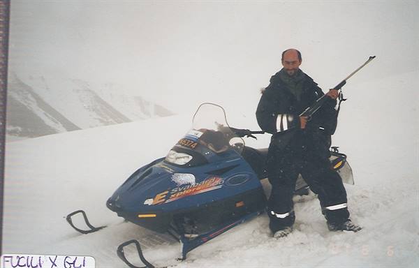 Touring by snowmobile, watching out for polar bears