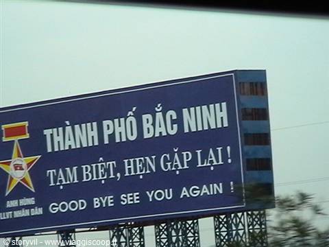 Blue Ben Hing Nam Dan billboard reading Tam Biet, Hen Gap Lai, Good Bye See You Again