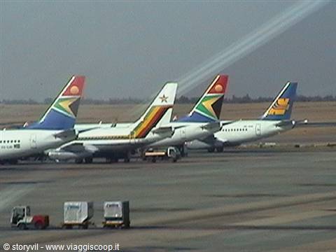 South African Airways aircraft tails parked on the airport tarmac