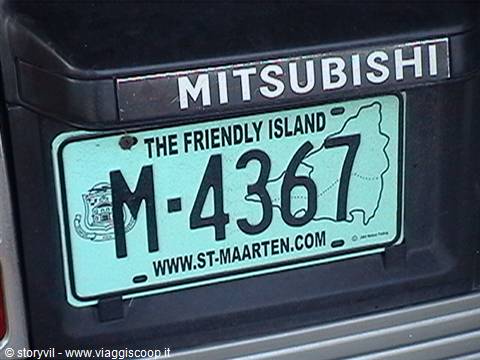 Turquoise St Maarten license plate M-4367 with island map on Mitsubishi