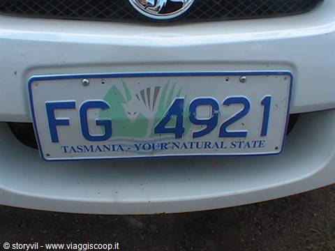 White FG 4921 Tasmania plate reading Your Natural State on a white car