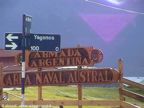 Wooden signs of Armada Argentina and Yaganes street in Ushuaia
