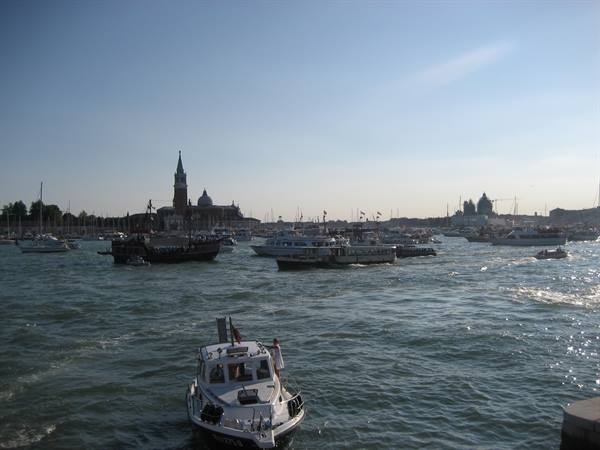 Boats and ferries on the Venice lagoon with San Giorgio Maggiore in the background