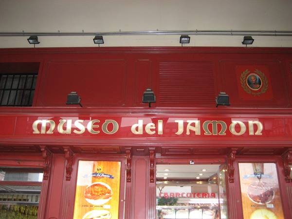 Red sign with golden letters of the Museo del Jamon in Madrid