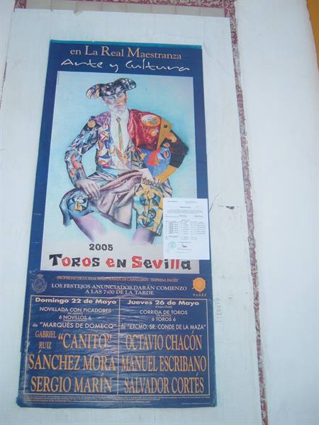2005 bullfight poster glued on a wall at Seville's Real Maestranza