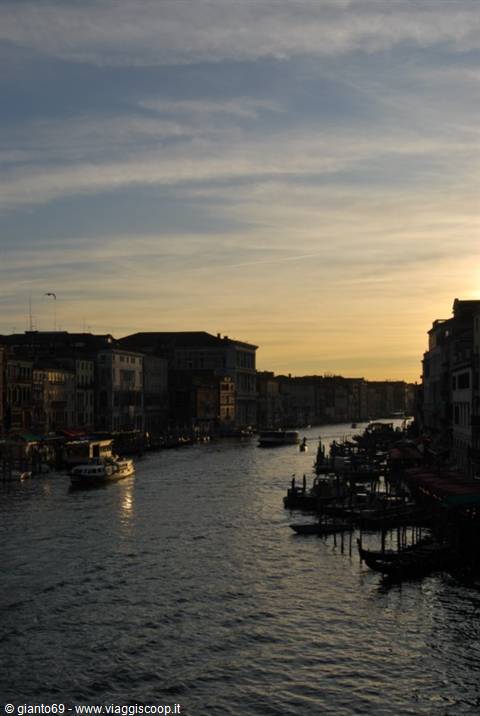 Venice: boats and palaces along the Grand Canal in golden sunset light