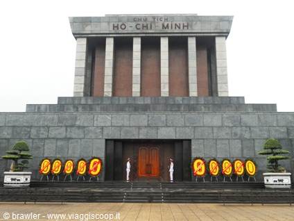 Ho Chi Minh Mausoleum in Hanoi, white-uniformed guards at entrance