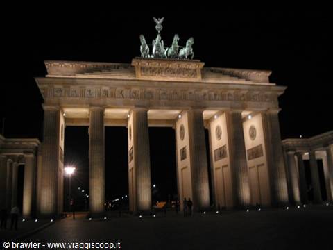Brandenburg Gate at night, lit columns and bronze quadriga