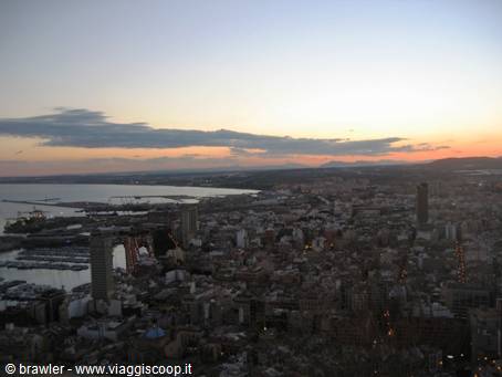 Alicante from Santa Bárbara castle: city, harbor and bay at dusk