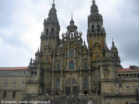 Baroque facade of Santiago de Compostela cathedral under cloudy sky