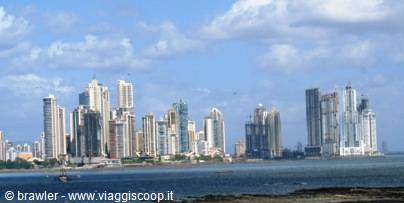 Skyscrapers along Panama City bay, cloudy sky and calm sea
