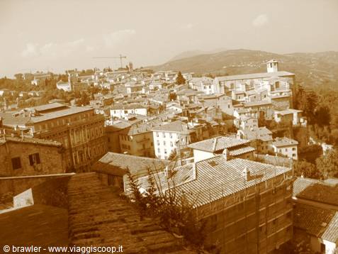 Sepia-toned brick rooftops and old stone houses of Perugia