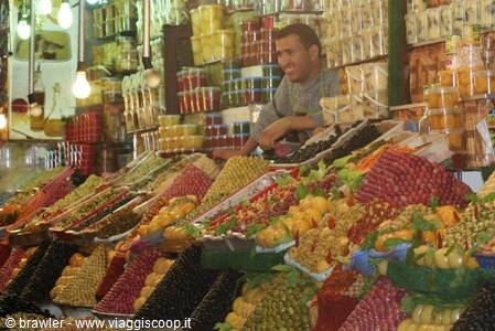 Dried fruit and olive vendor at Marrakech souk