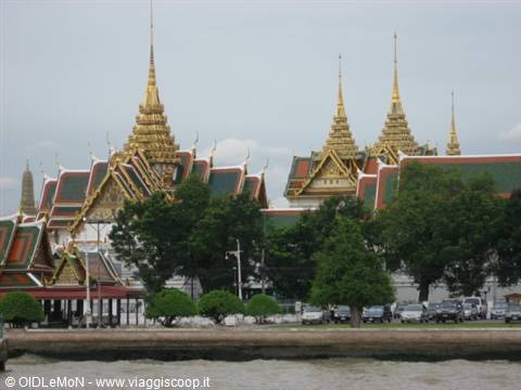 Golden spires of Bangkok's Grand Palace seen across the Chao Phraya river
