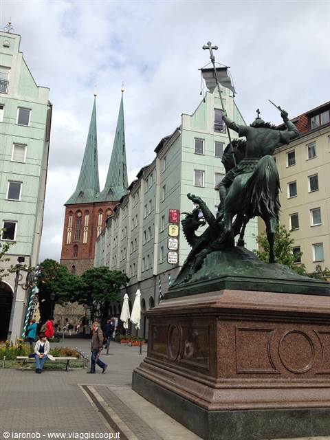 Bronze statue of Saint George slaying the dragon in front of Berlin's Nikolaikirche