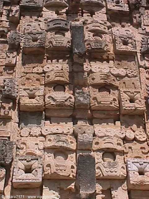 Stone facade carved with Chaac god masks at Kabah