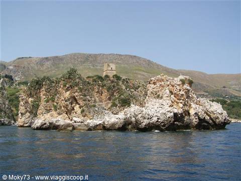 Scopello faraglioni rocks with the old tower above
