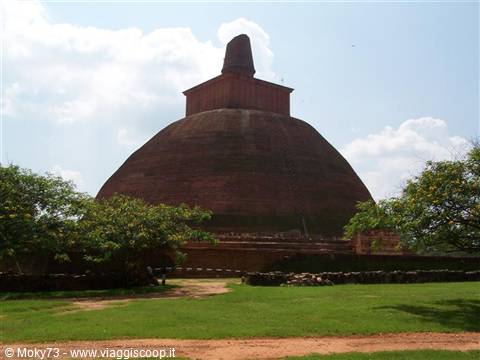Jetavanaramaya stupa at Anuradhapura, ancient brick dome among trees and grass