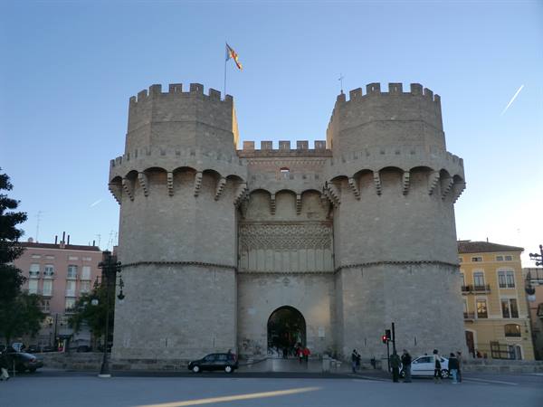 The Torres de Serrano in Valencia, medieval stone gate under blue sky