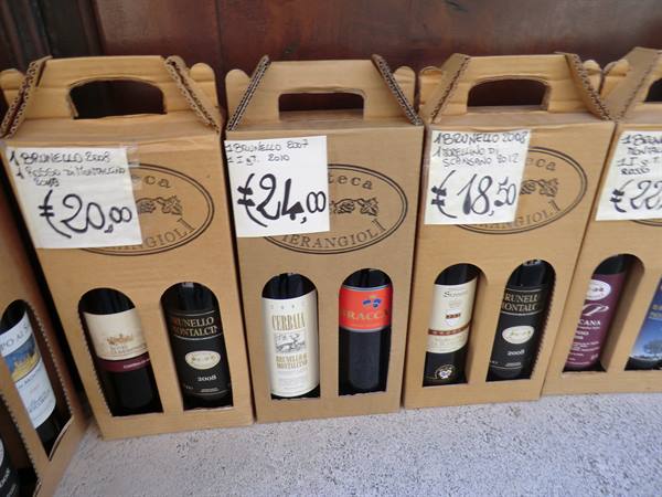 Cardboard boxes with Brunello and Gran Anea bottles at Enoteca Ferrangoli