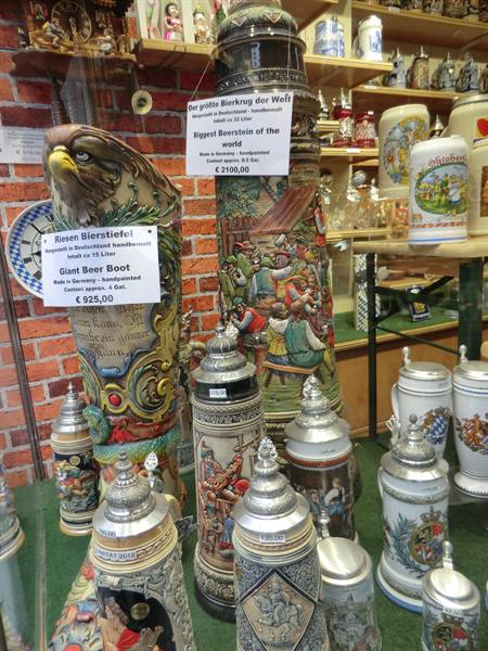 Decorated ceramic beer steins in a shop, world's biggest beer boot, Bavaria