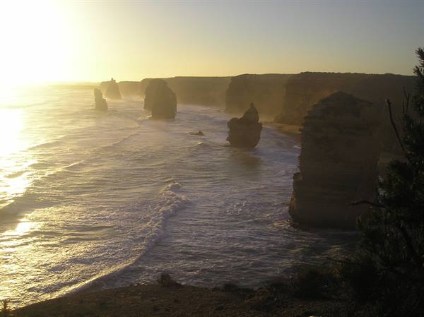 Golden sunrise over the Twelve Apostles, limestone stacks in the ocean