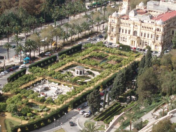 Pedro Luis Alonso gardens in Malaga with gazebo and ornate buildings