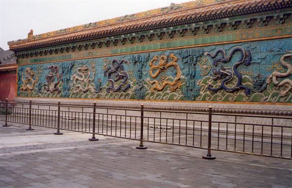Nine-Dragon Wall in Beijing, glazed ceramic tiles under grey sky