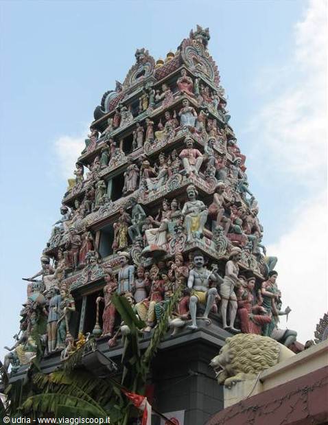 Sri Mariamman Temple gopuram covered with colorful Hindu deity statues